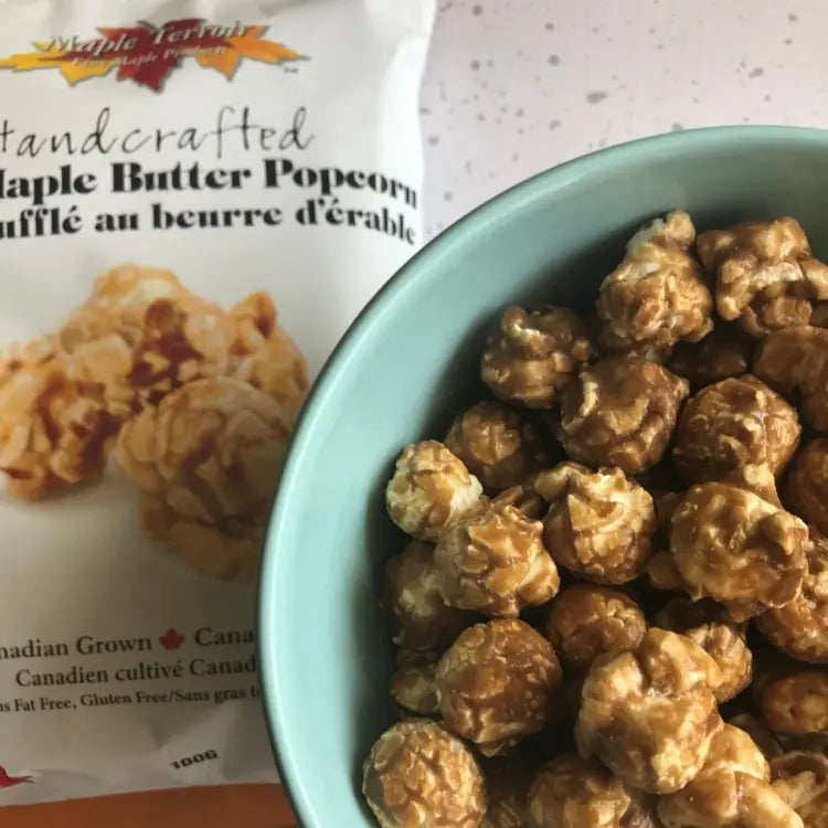 Bowl of Pure Maple Butter Popcorn with bag in background